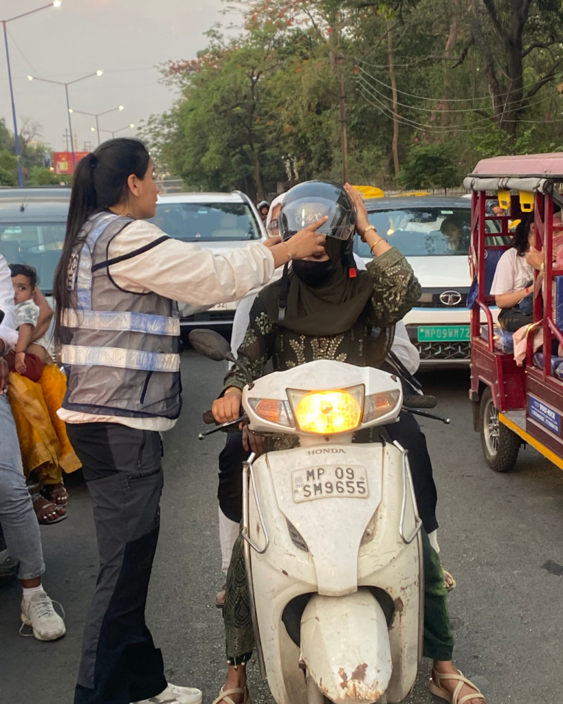 Patel motors CSR helmet distribution